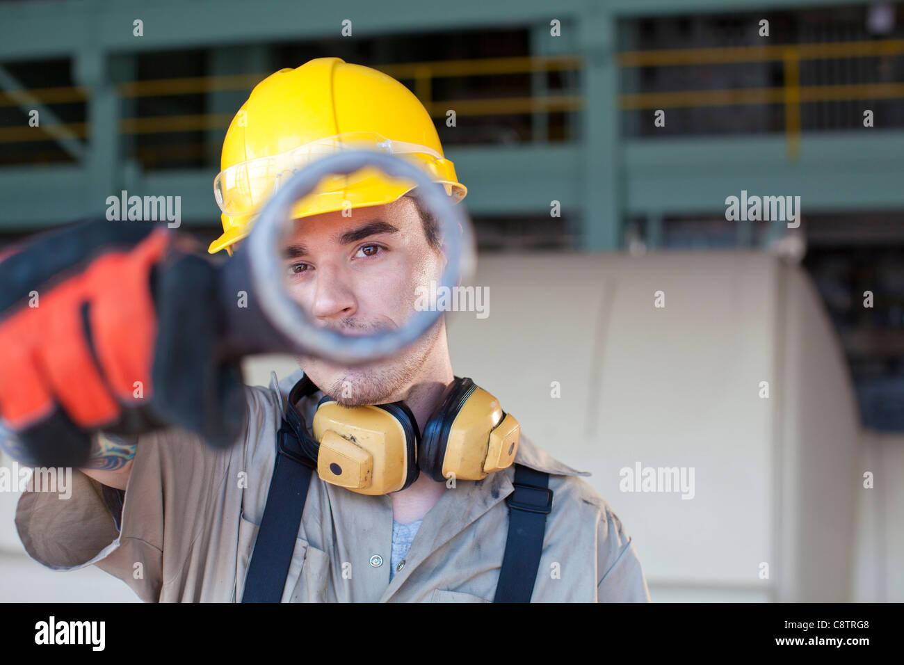 USA, New Mexico, Santa Fe, Portrait of male manual worker holding tool Stock Photo