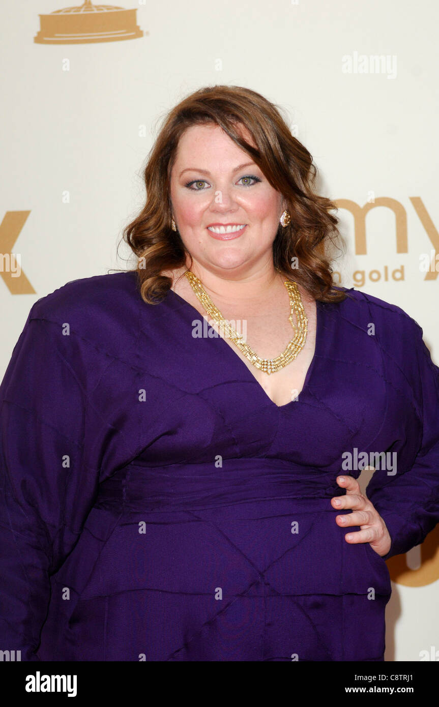 Purple dress with gold necklace hi-res stock photography and images - Alamy