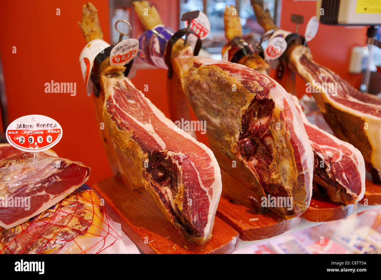 Jamon (Spanish ham) displayed in deli. Salou, Catalonia, Spain. Stock Photo
