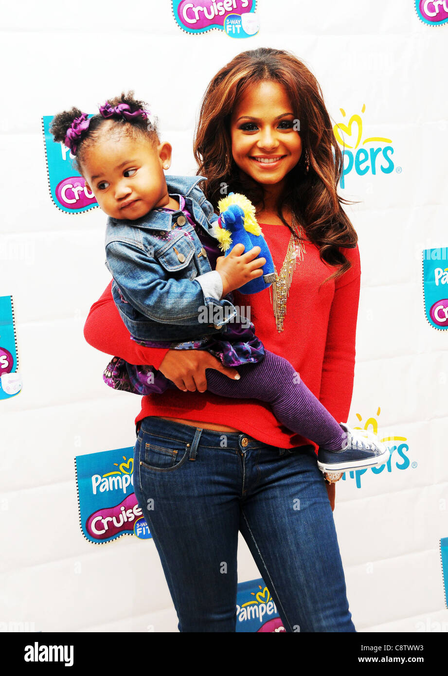 Christina Milian, daughter Violet Nash at in-store appearance for Pampers  Unveils Improved Cruisers Diapers at Play-a-Palooza Stock Photo - Alamy, image size:921x1390