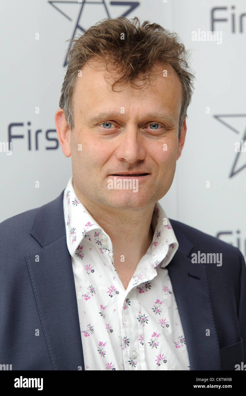 Hugh Dennis arrives for the First Light Awards at a central London