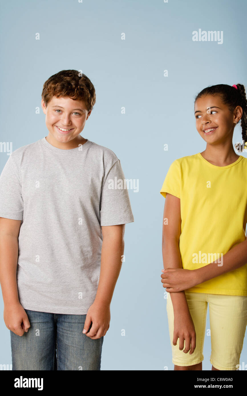 Studio portrait of boy and girl Stock Photo - Alamy