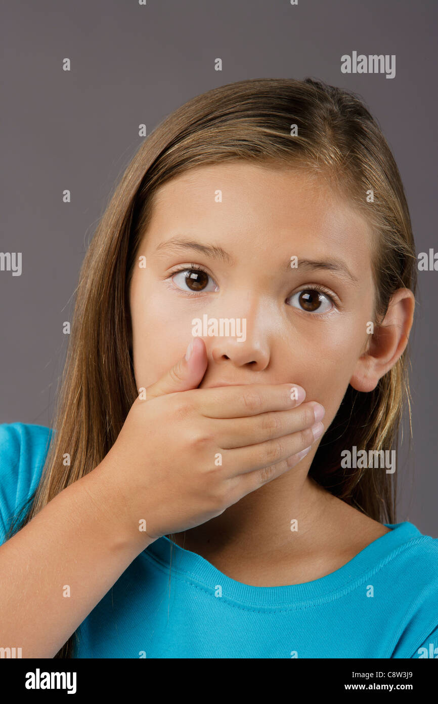 Portrait of surprised girl, studio shot Stock Photo - Alamy