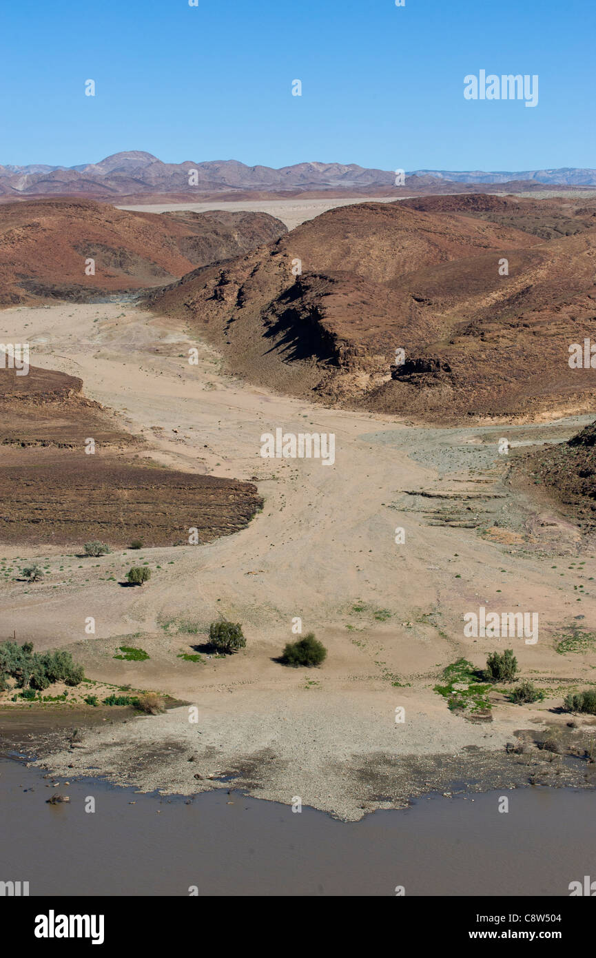 Dry river bed Richtersveld National Park South Africa view across the Oranje River from a view point west of Aussenkehr Namibia Stock Photo