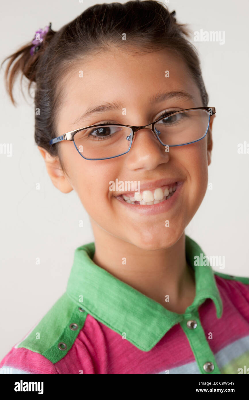Studio portrait of girl wearing eyeglasses Stock Photo