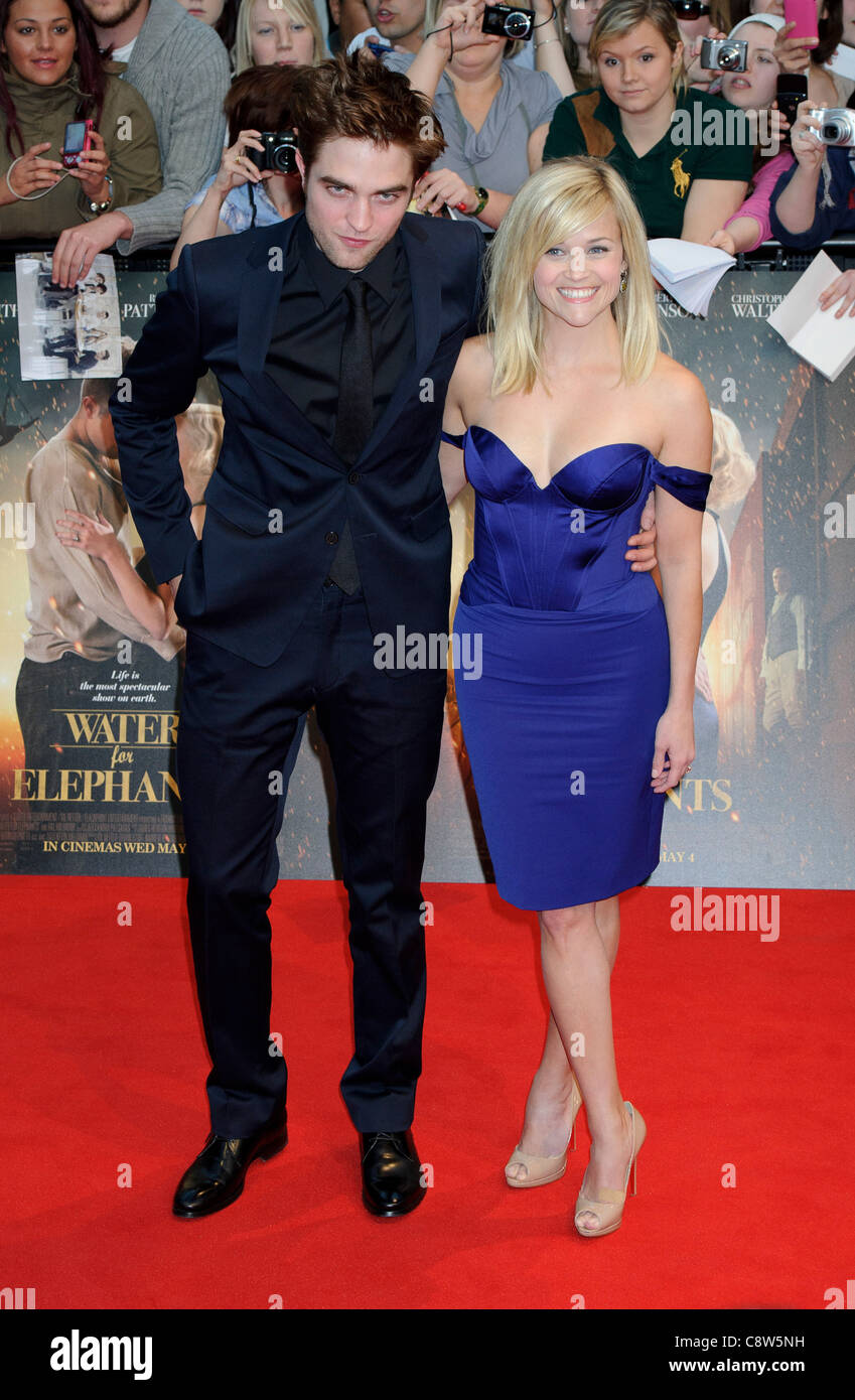 US actress Reese Witherspoon and British actor Robert Pattinson arrive for the UK film premiere Water For Elephants. Stock Photo