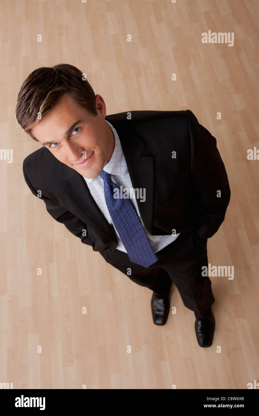 Portrait of young businessman smiling Stock Photo - Alamy