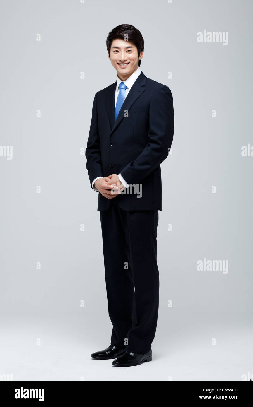 Portrait Of Smiling Asian Businessman Stock Photo - Alamy
