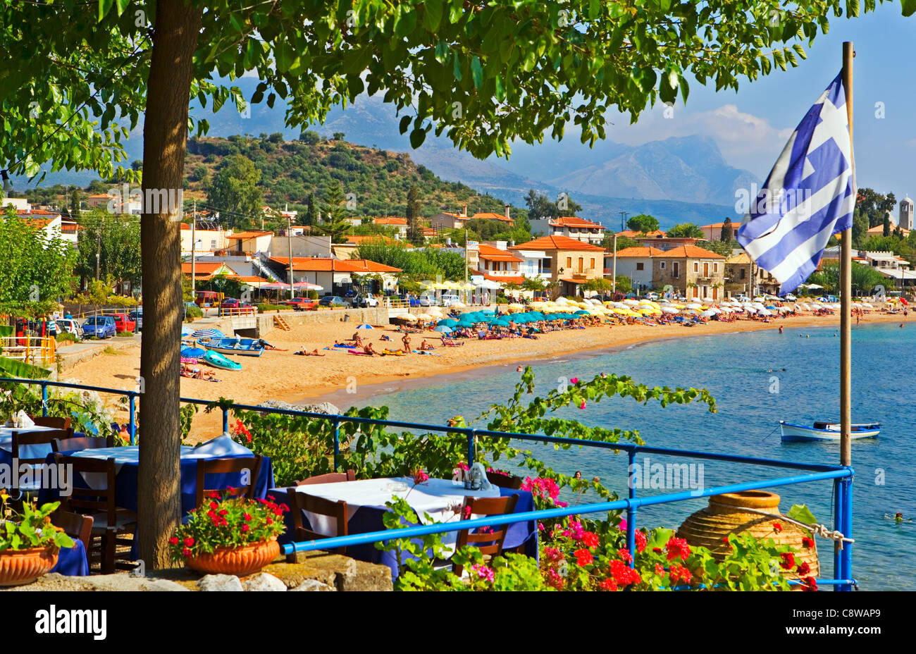 VIEW TO TOWN AND BEACH IN STOUPA GREECE Stock Photo