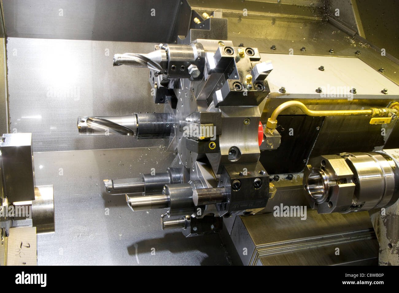 CNC lathe detail turret with tools Stock Photo Alamy