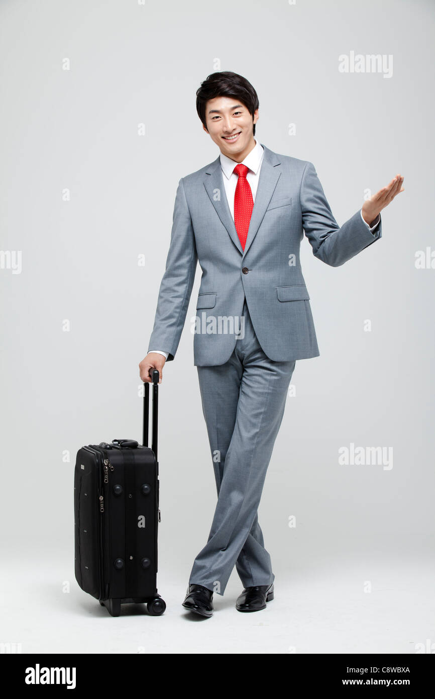 Man suit full length raising hand hi-res stock photography and images ...