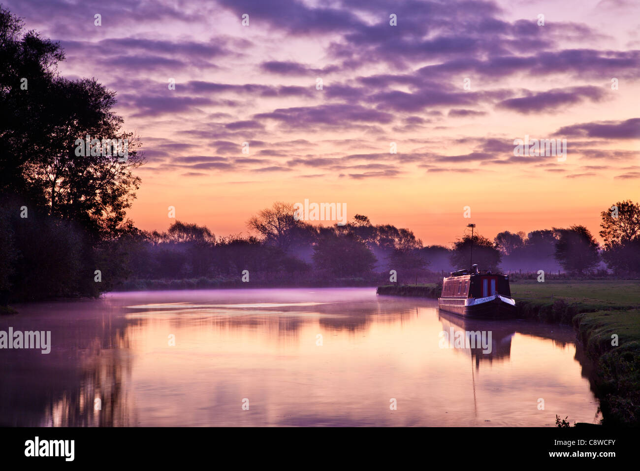 A misty Cotswold autumn sunrise on the River Thames at Lechlade, Gloucestershire, England, UK Stock Photo