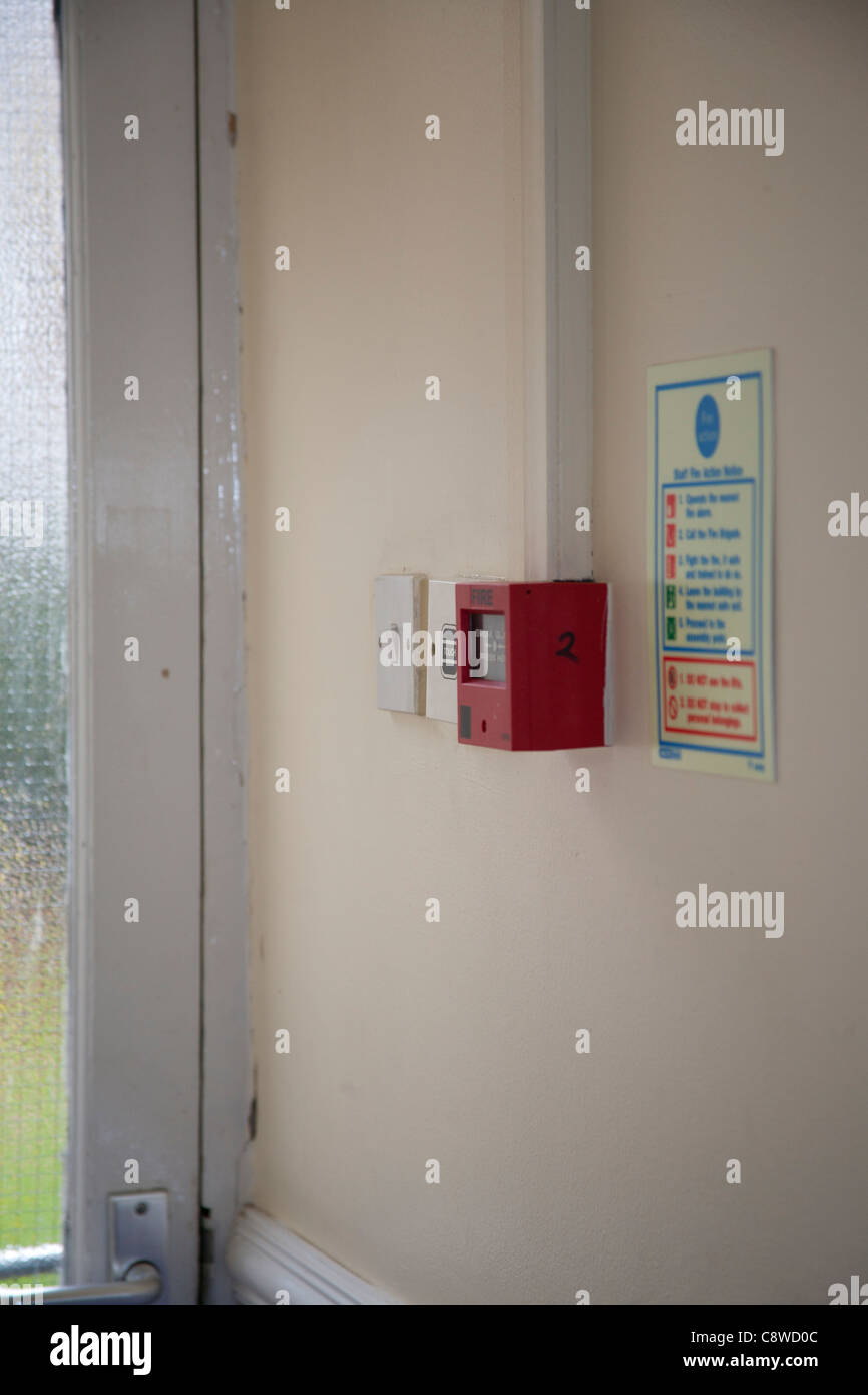 Installed Fire alarm call point with Emergency Exit Signs, near Doorway