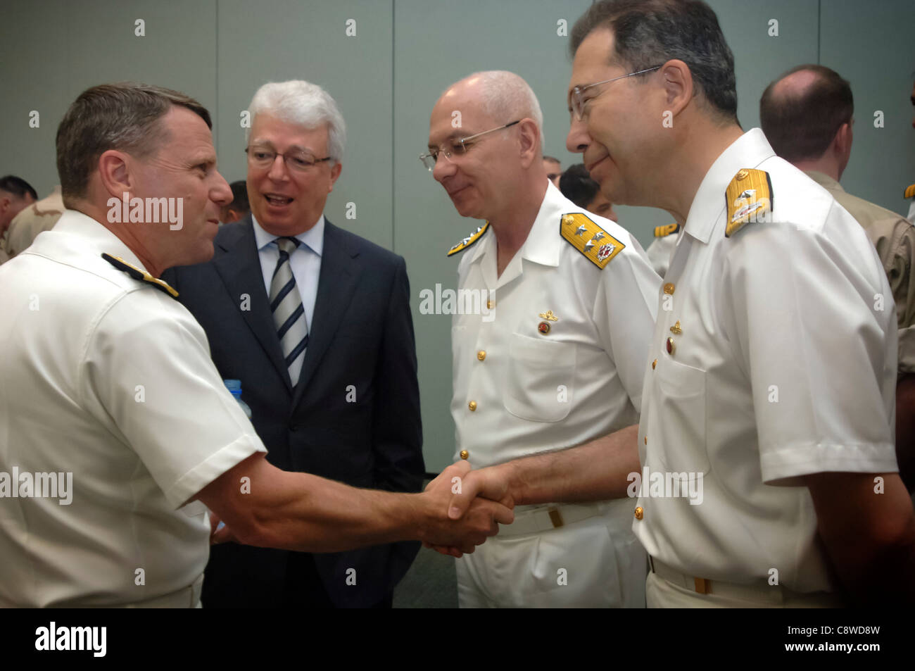 Vice Adm. Bill Gortney, Commander, Combined Maritime Forces, greets Turkish Navy Rear Adm. Caner Bener Stock Photo