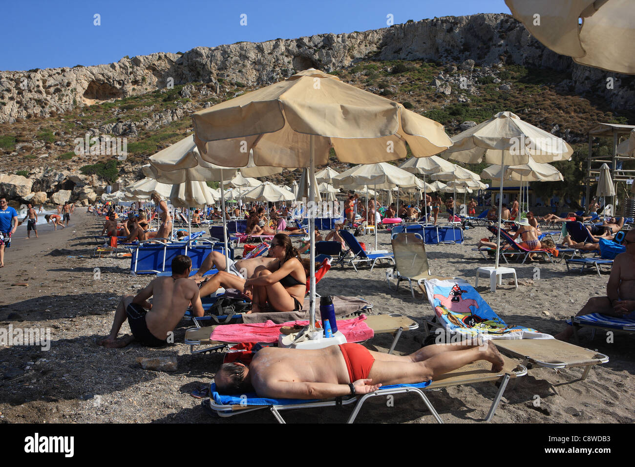 Kaki Thalassa - busy beach in Greece which is located less than 50km south of the centre of Athens Stock Photo