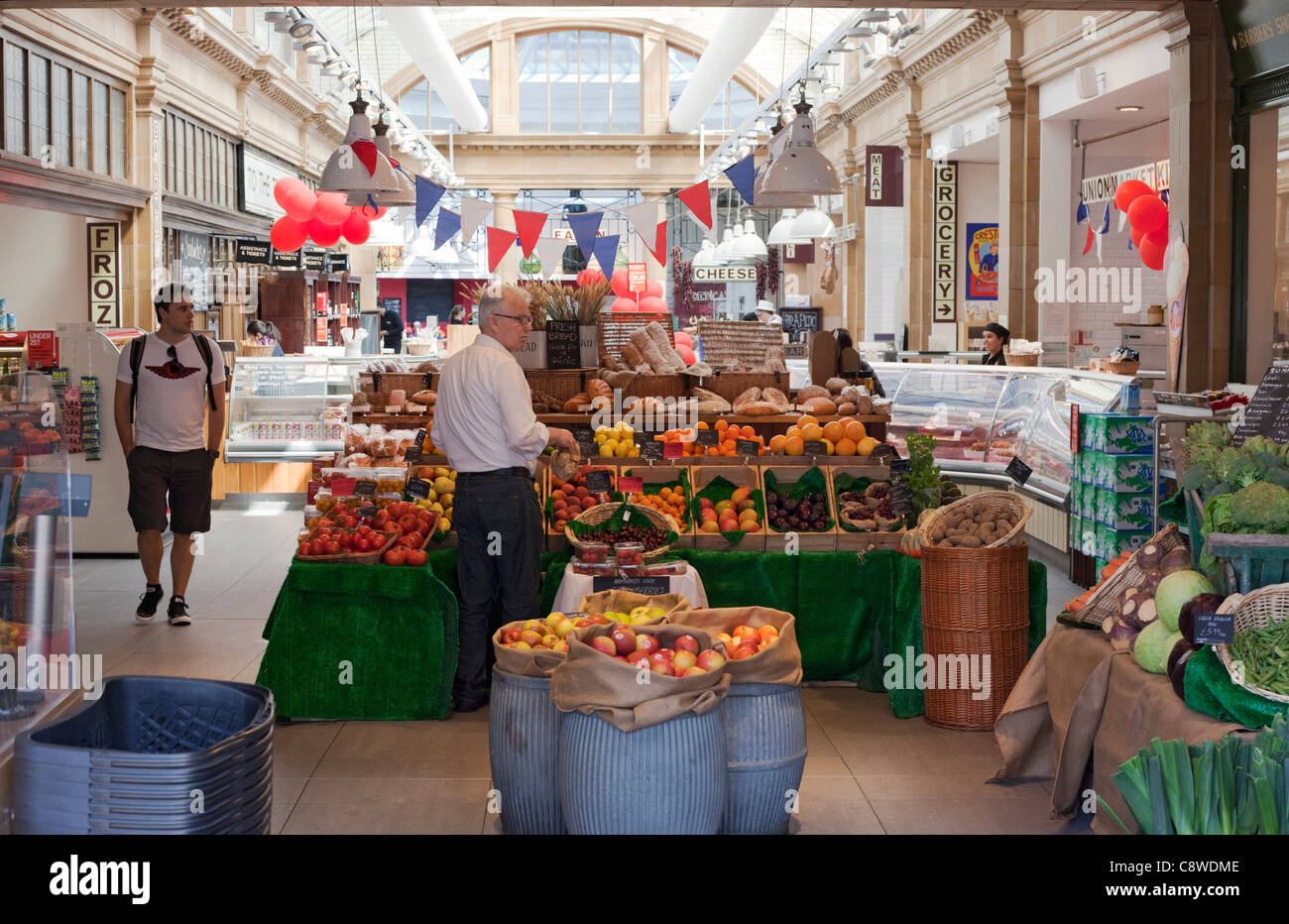 Union Market at Fulham Broadway Station atrium, fruit and veg section Stock Photo