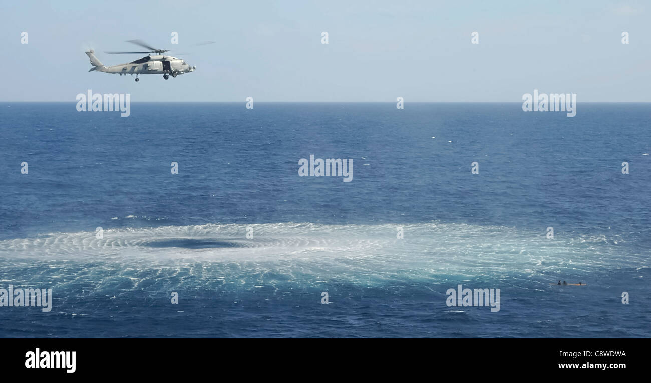 An SH-60B Sea Hawk helicopter, assigned to Helicopter Anti-Submarine Squadron Light (HSL) 37, Stock Photo