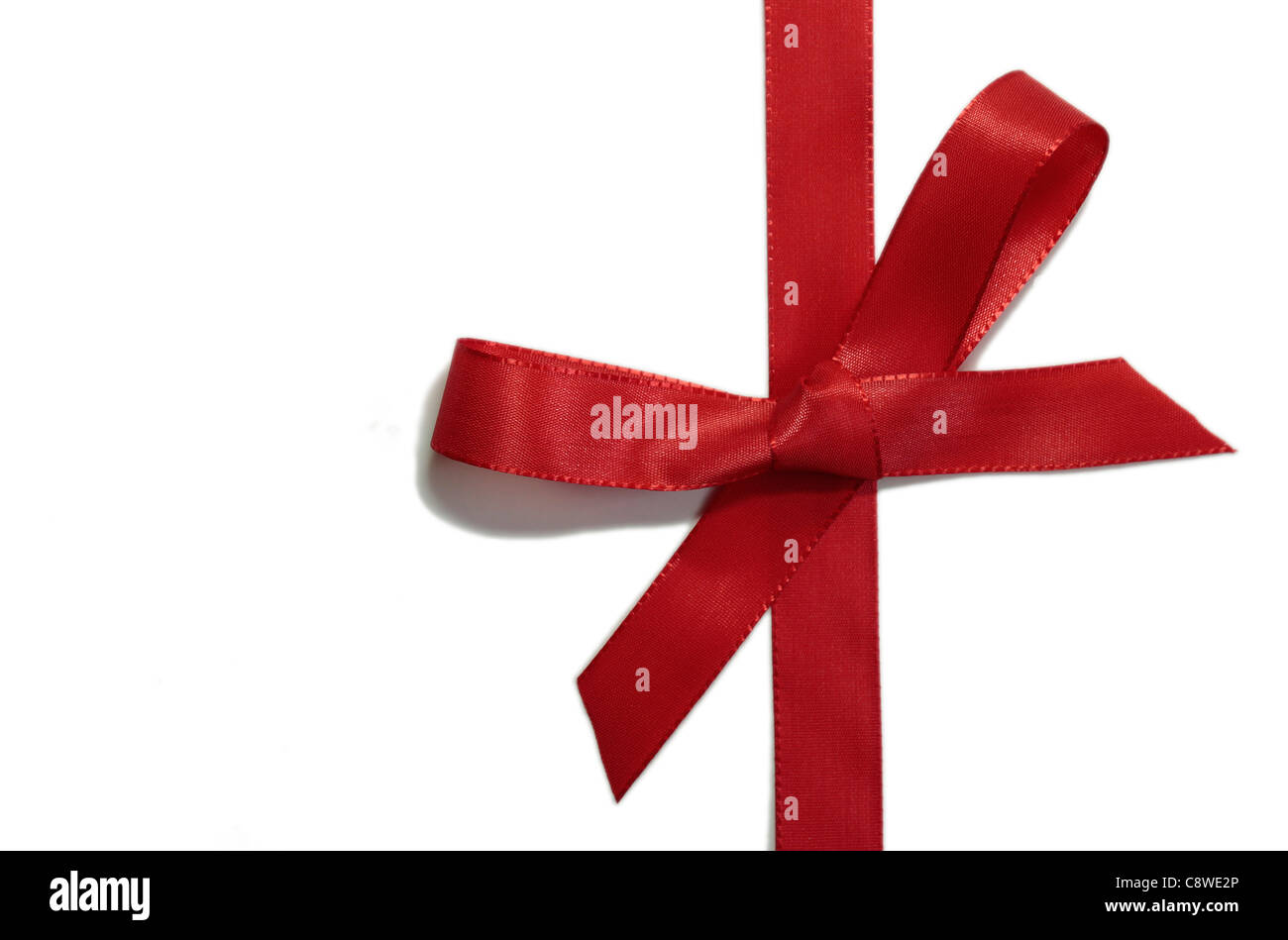 Red ribbon isolated on a white background Stock Photo - Alamy