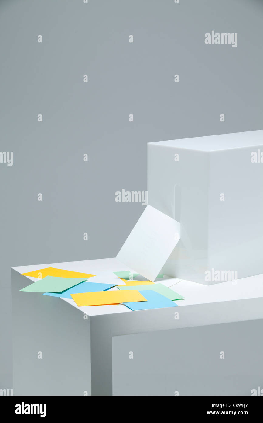 Ballots Stuffed And Ballot Box On Desk Stock Photo