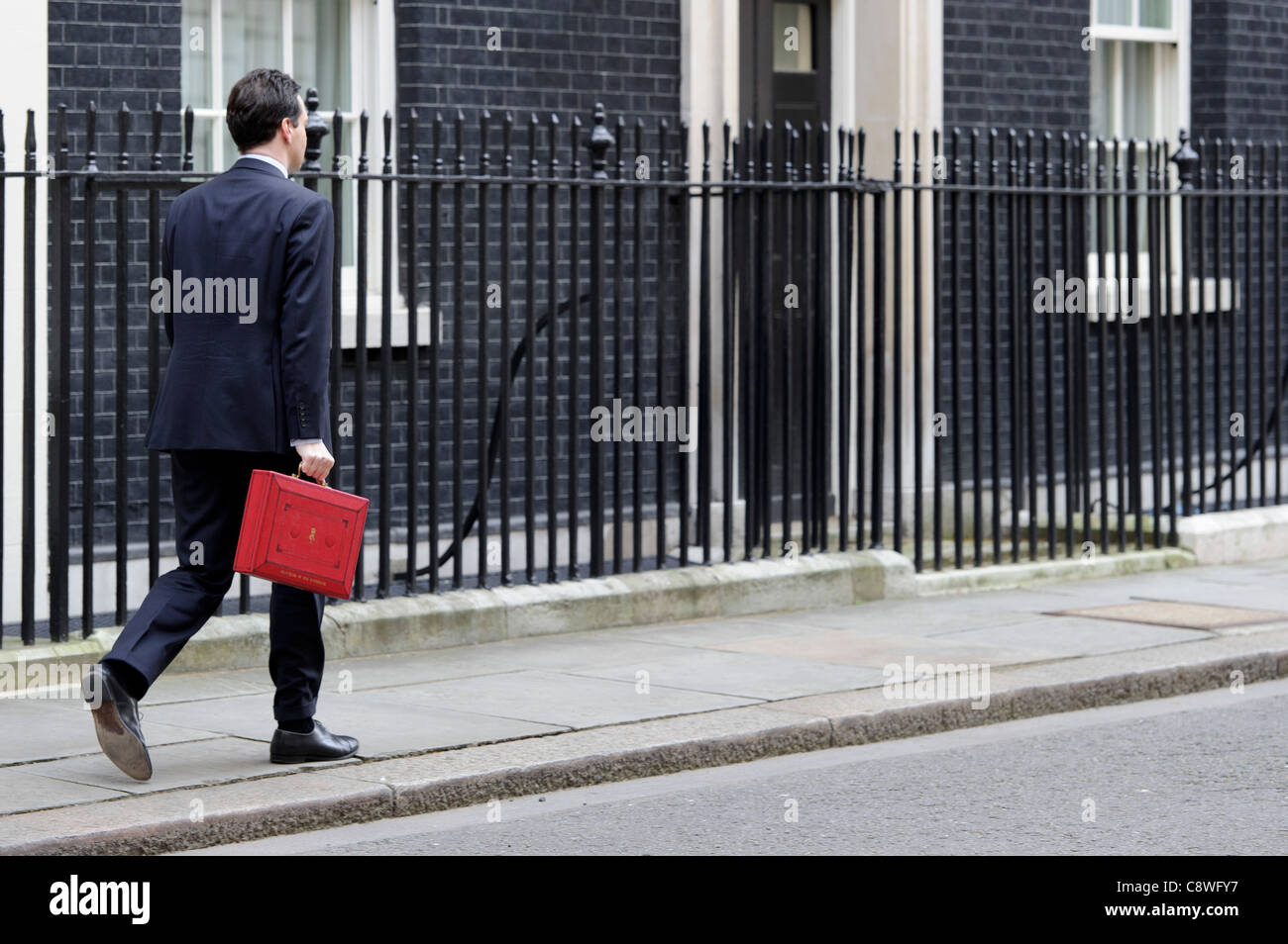 Britain's Chancellor of the Exchequer George Osborne poses for the media with his traditional red dispatch box. Stock Photo