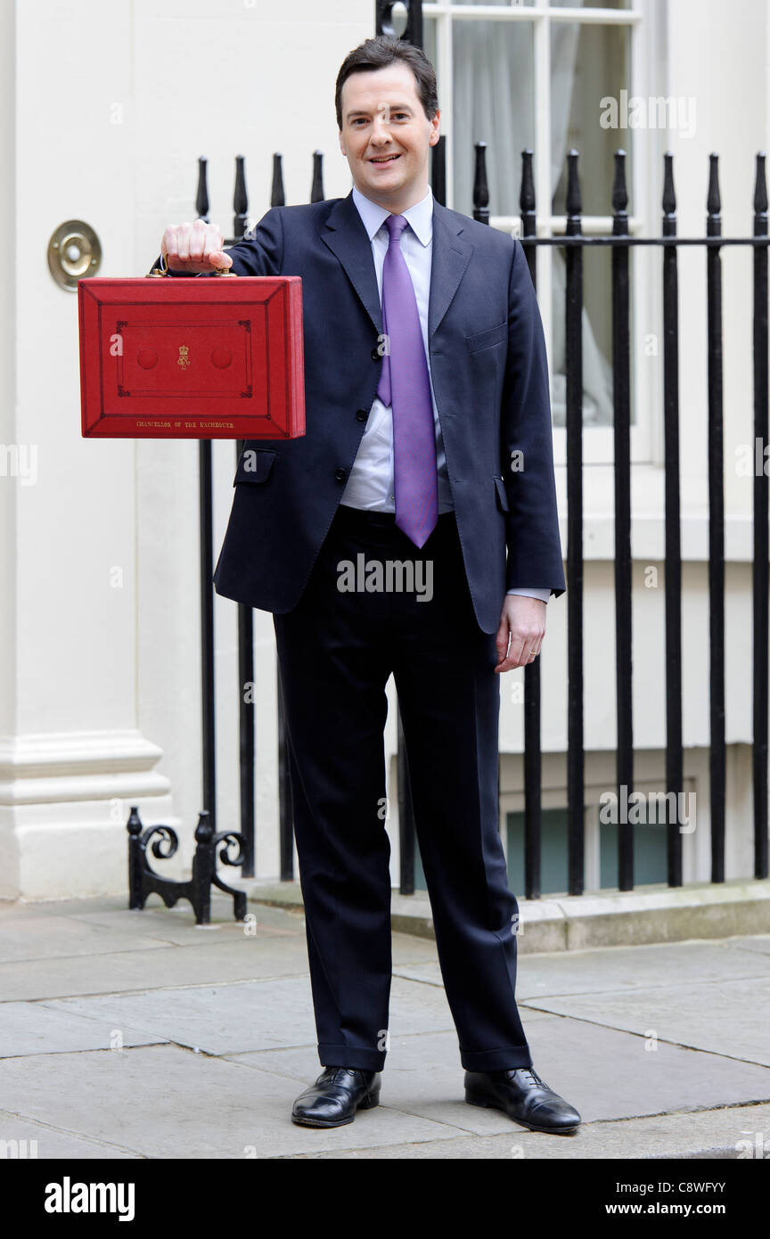 Britain's Chancellor of the Exchequer George Osborne poses for the media with his traditional red dispatch box. Stock Photo