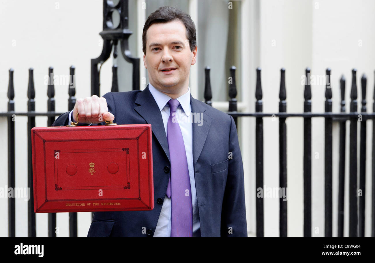 Britain's Chancellor of the Exchequer George Osborne poses for the media with his traditional red dispatch box. Stock Photo