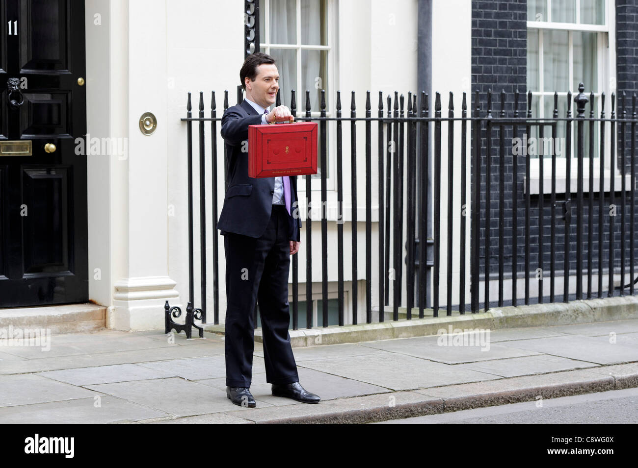 Britain's Chancellor of the Exchequer George Osborne poses for the media with his traditional red dispatch box. Stock Photo