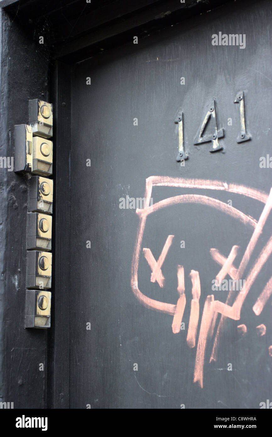 Door bells for multiple flats, Brick Lane, East london Stock Photo