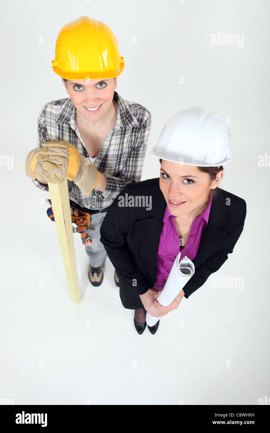 businesswoman and craftswoman posing together Stock Photo - Alamy