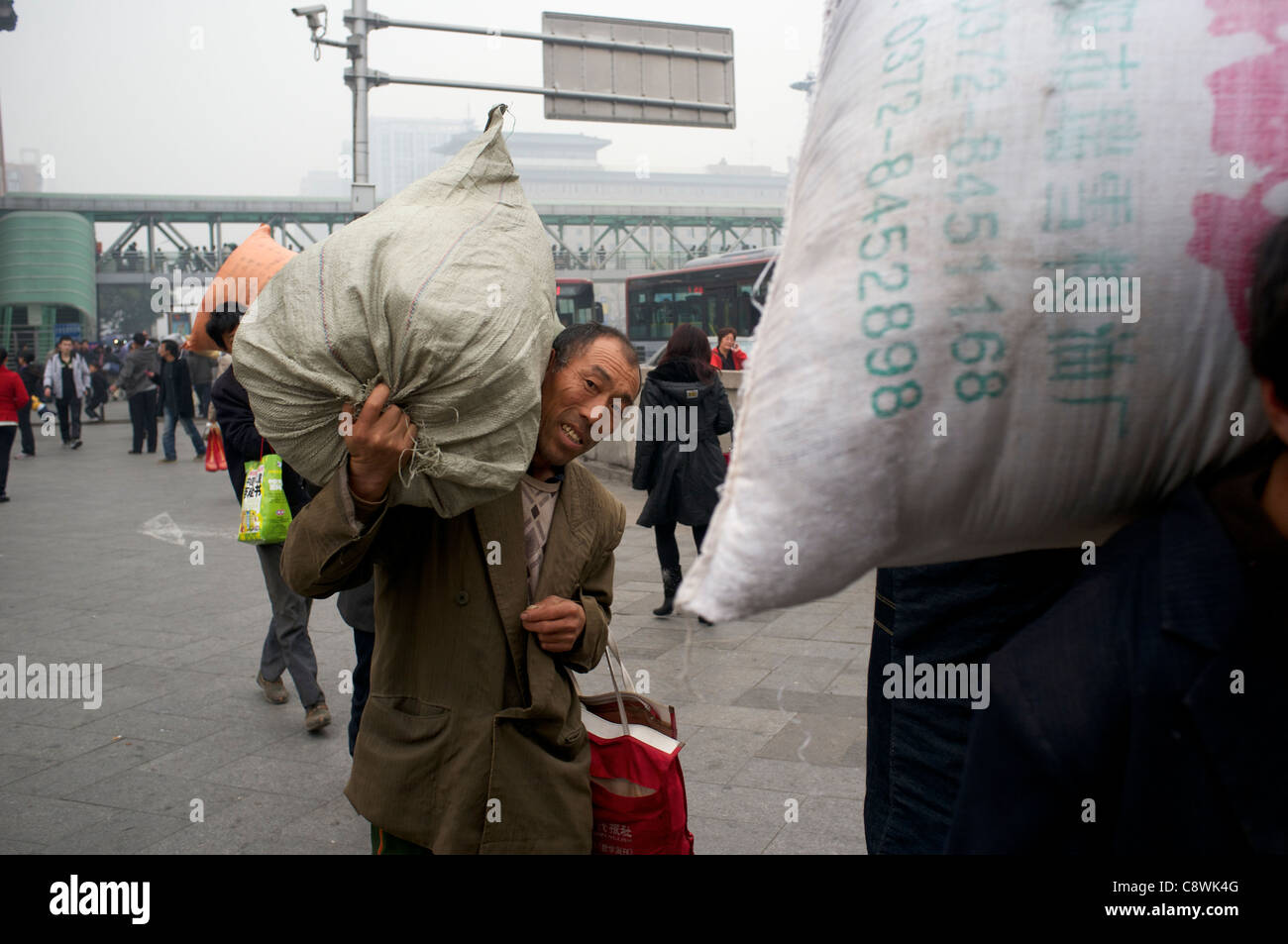 Migrant workers beijing railway station hi-res stock photography