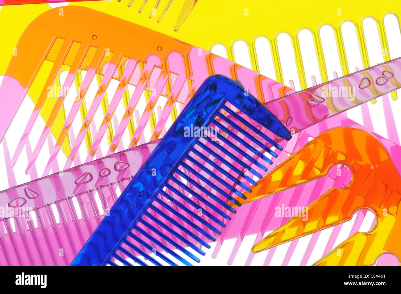 Comb Overlay Transparent Set multi-coloured transparent combs. It is photographed on a gleam. It ...