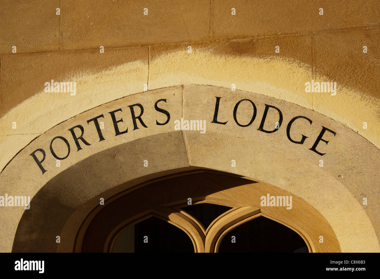 Porters Lodge sign in stone archway at Trinity College Cambridge England UK Stock Photo