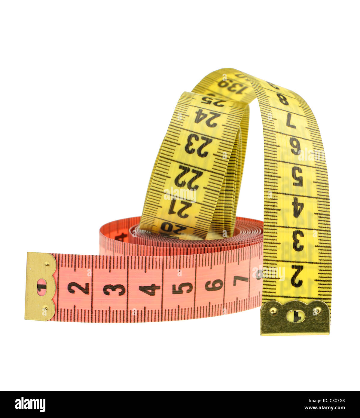 Imperial tailors tape measure, cut out or isolated against a white  background Stock Photo - Alamy