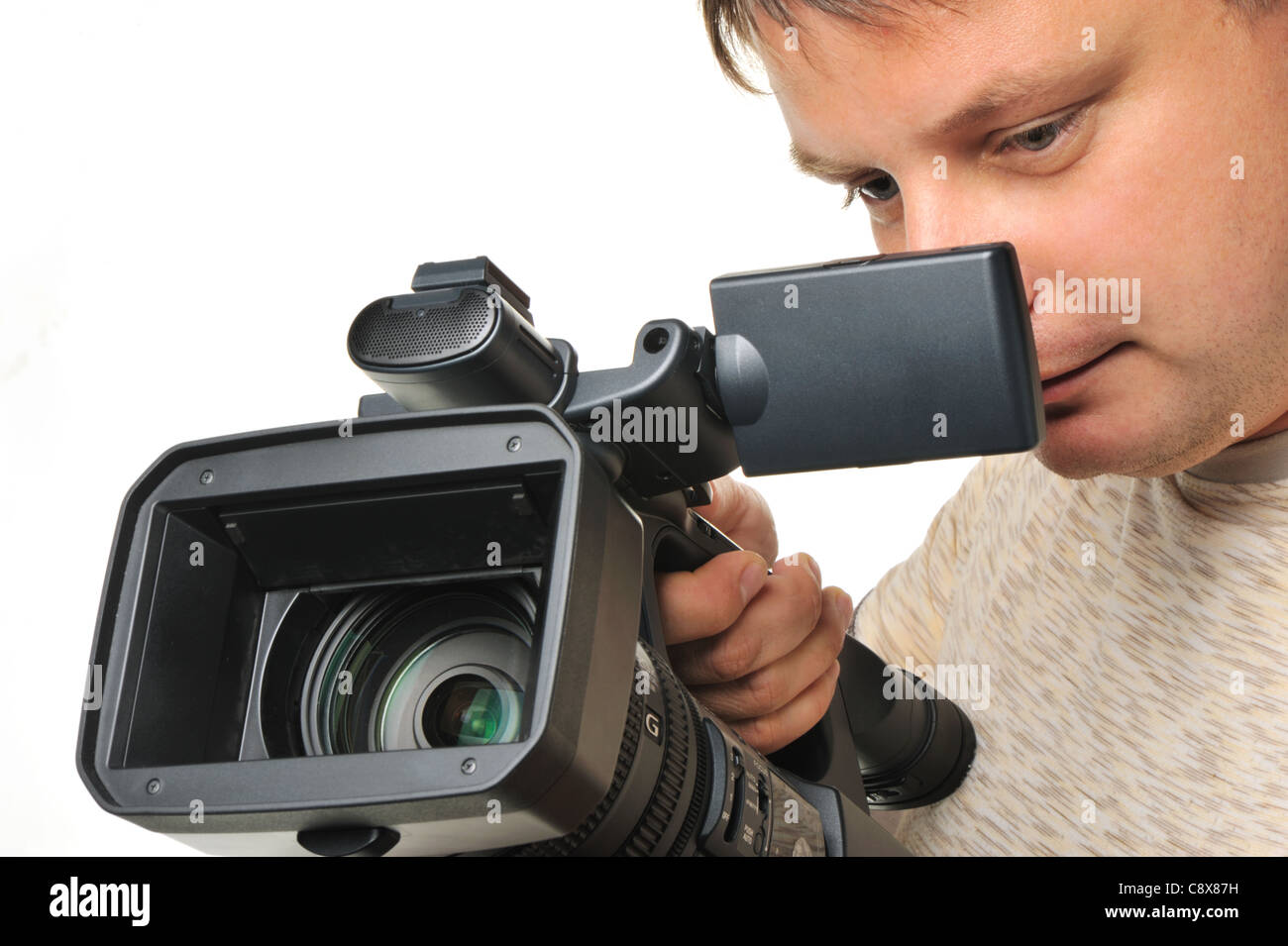 The man with a videocamera. It is isolated on a white background Stock ...