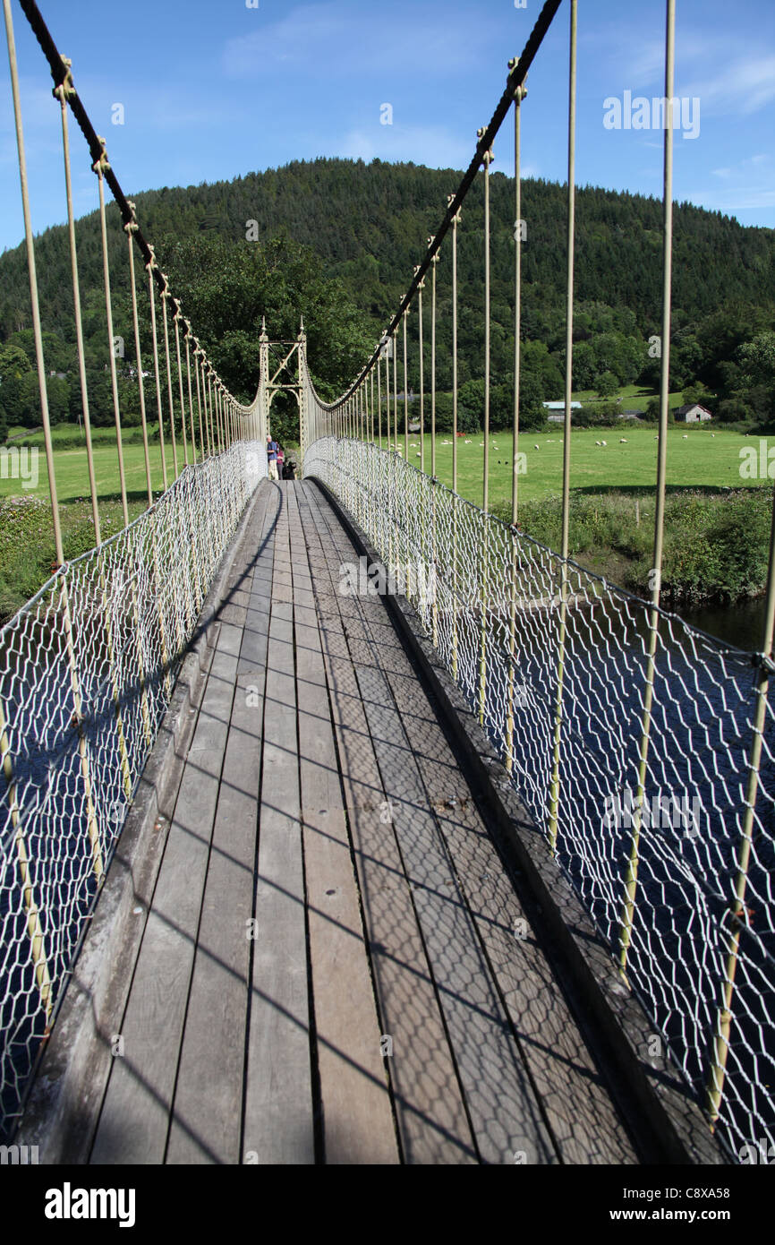 Village of Betws-y-Coed, Wales. Picturesque view of Sappers Suspension Bridge over the River Conwy. Stock Photo