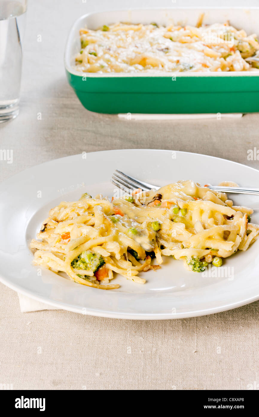 Cheese Spaetzle bake with vegetables in creamy sauce Stock Photo Alamy