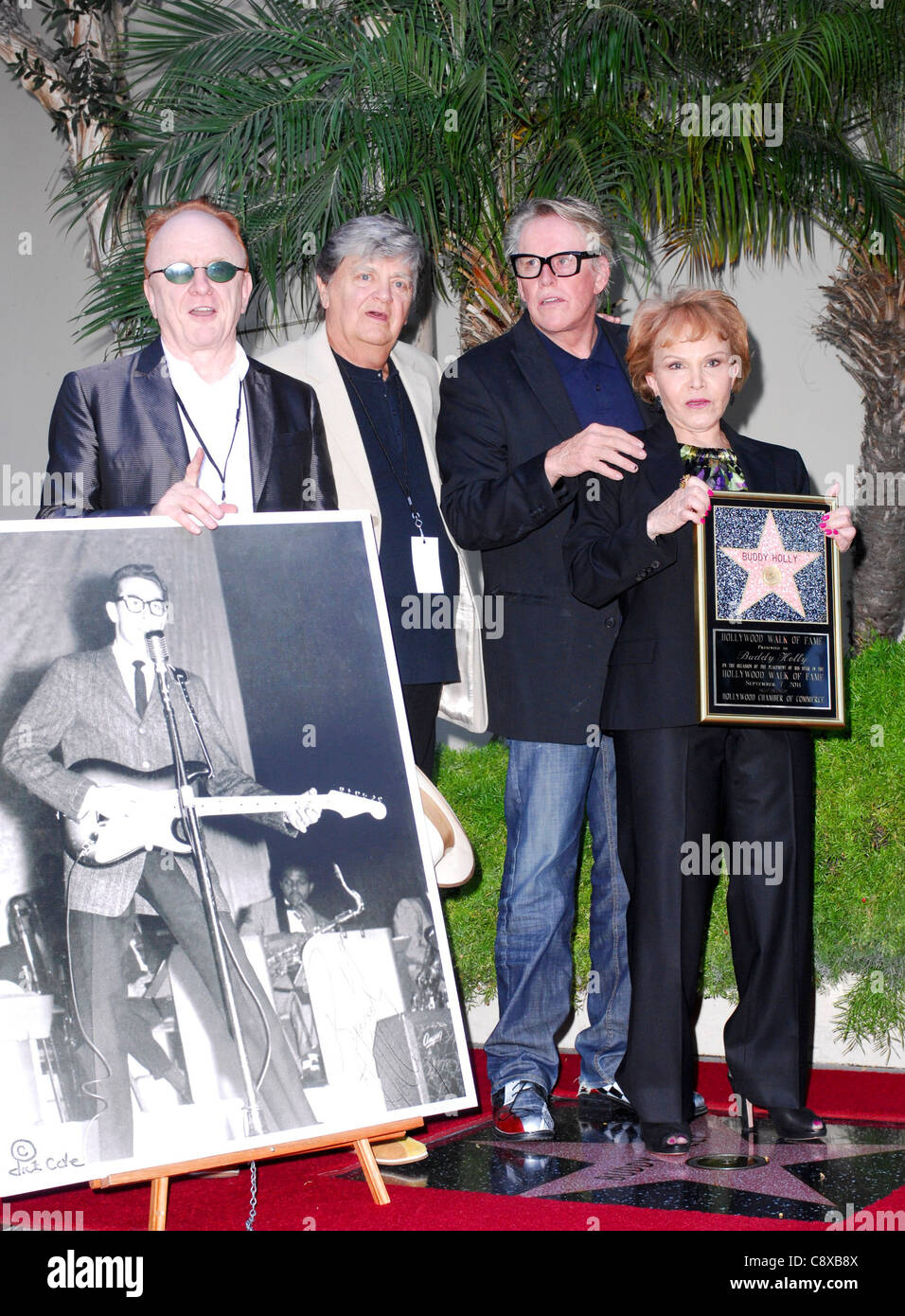 From left Peter Asher Phil Everly Gary Busey Maria Elena Hollypicture Buddy Holly atinduction ceremony Star onHollywood Walk Stock Photo