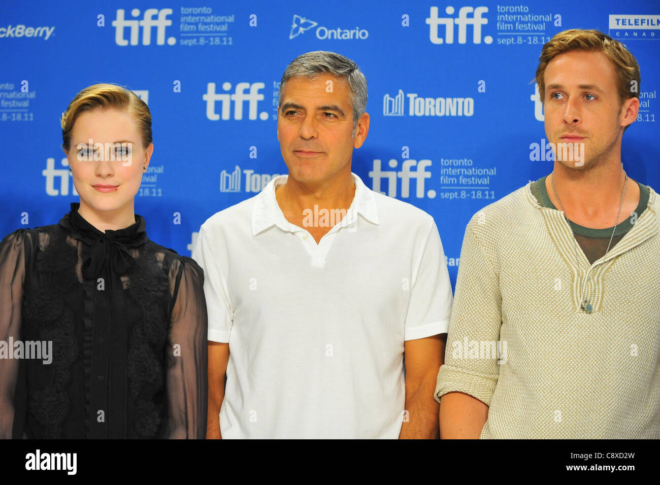 Evan Rachel Wood George Clooney Ryan Gosling atpress conferenceIDES MARCH Press Conference Toronto International Film Festival Stock Photo
