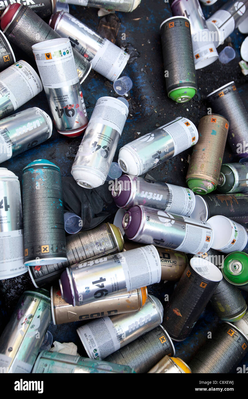 Empty paint spray cans used for graffiti and street art in a trash can in  Nantes, France Stock Photo - Alamy