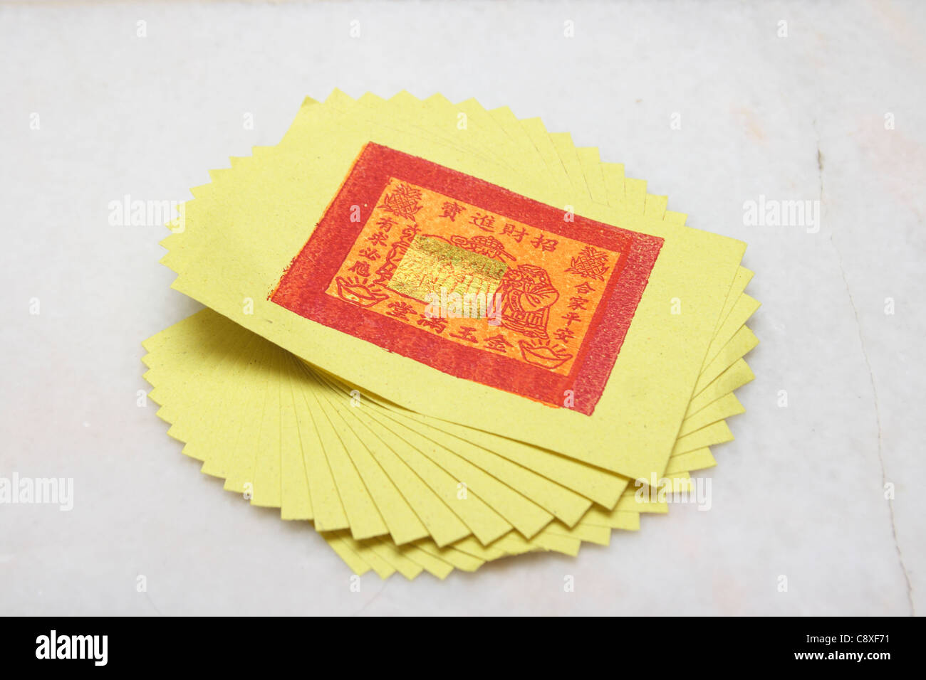 Joss Paper Roll In A Shape, Gold And Silver Colored For Burning In Chinese  Traditional Activity Stock Photo, Picture and Royalty Free Image. Image  111008837.