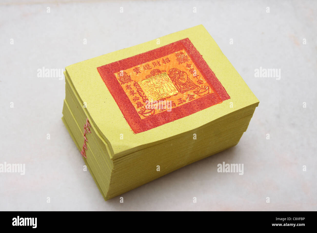 Silver paper, gold paper, joss paper for Chinese celebration isolated on  white background Stock Photo - Alamy