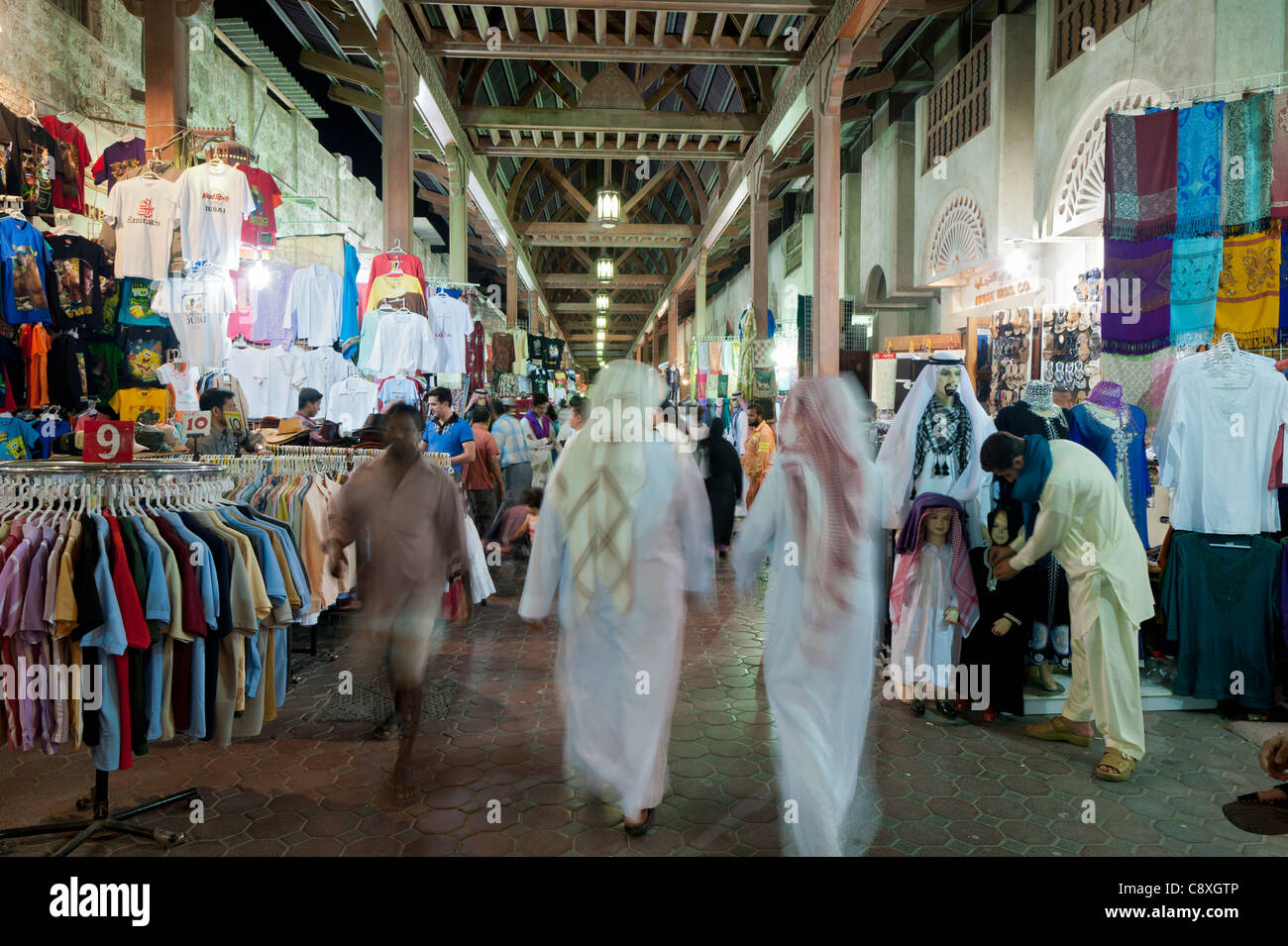 Night view of busy souq or market in Dubai UAE Middle East Stock Photo