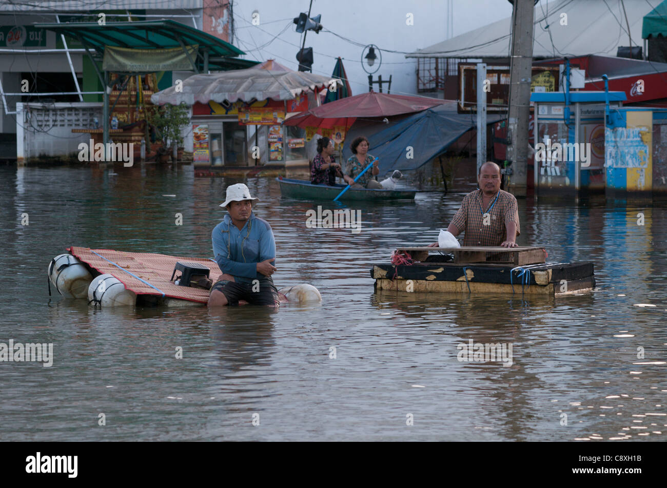 Natural disaster hits Bangkok. After weeks of flooding, boats & makeshift rafts have become the main type of transportation in Rangsit, a Northern Suburb of Bangkok, Thailand. Wednesday, November 2nd, 2011. Thailand is experiencing its worst flooding in more than 50 years. Credit Line: Kraig Lieb / Alamy Live News. Stock Photo