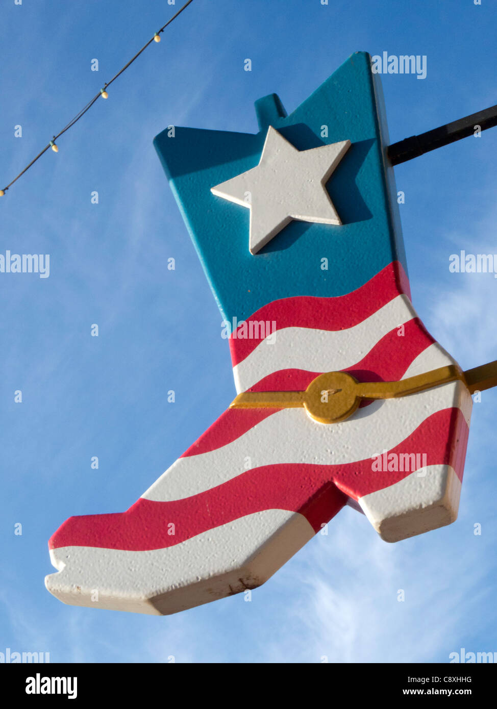 All-American cowboy boot on light pole in Old Town Scottsdale, Arizona Stock Photo