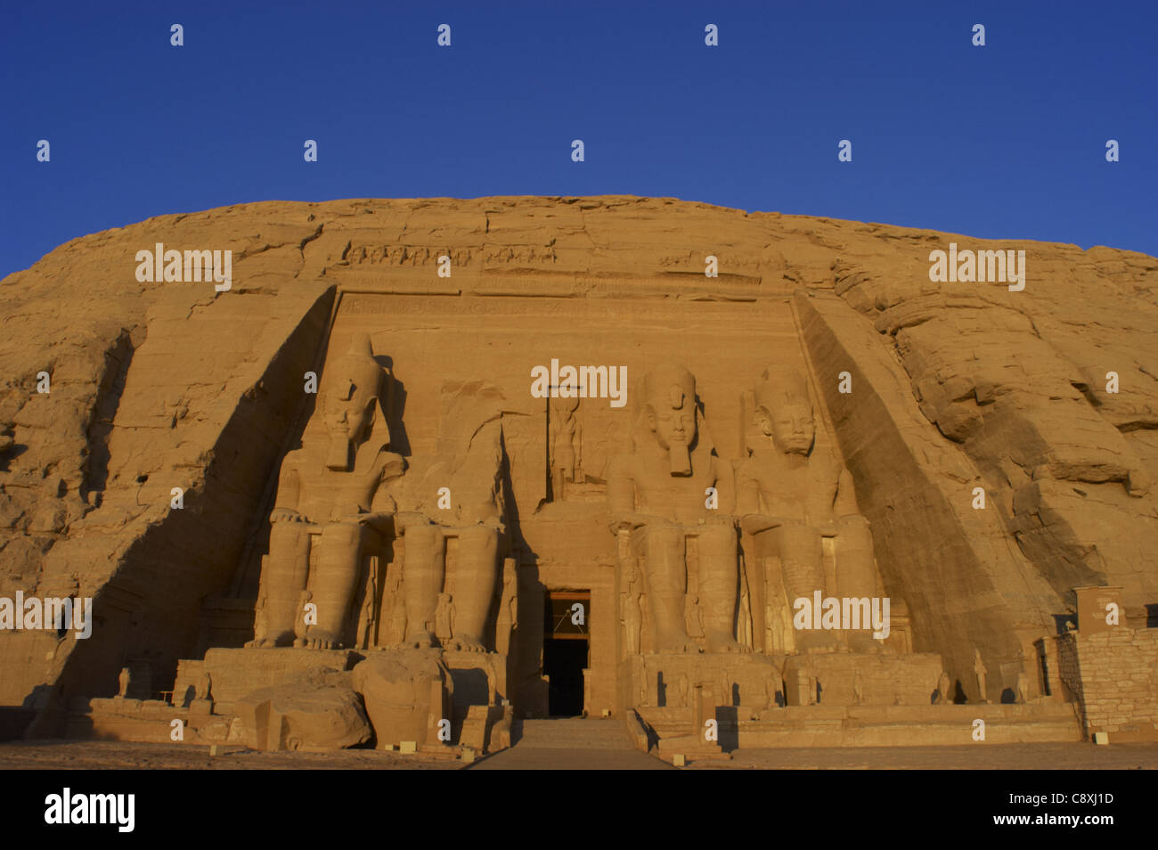 Egyptian art. Great Temple of Ramses II. Four colossal statues depicting the pharaoh Ramses II (1290-1224 BC). Abu Simbel. Egypt Stock Photo