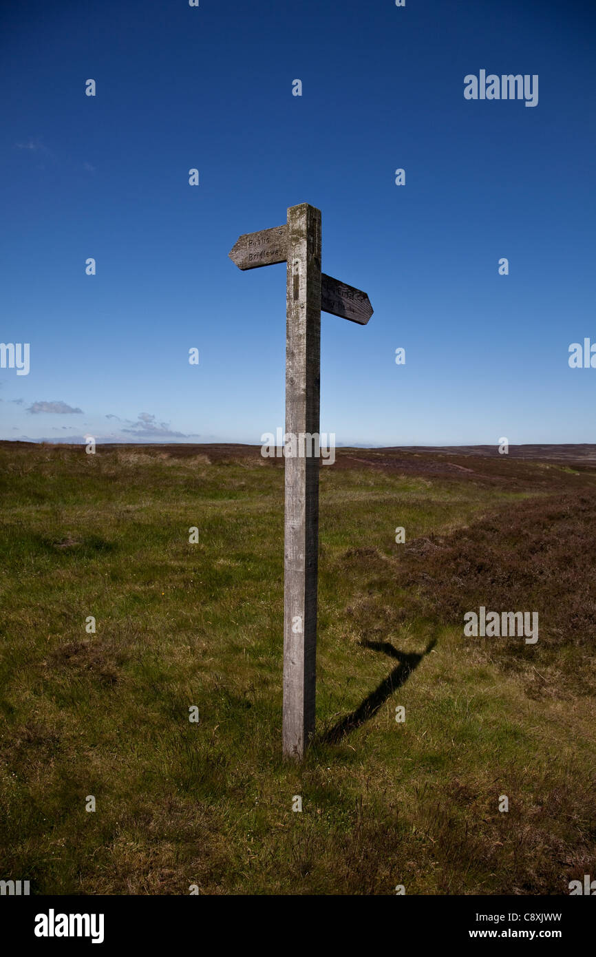 Wooden Countryside footpath sign, Baybridge, Weardale, Blanchland, Northumberland, England. UK Stock Photo