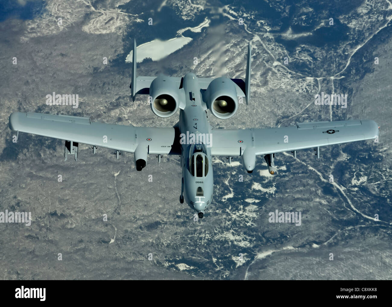 Col. Jon Mott breaks the record for the most documented hours in an A-10 Thunderbolt II during a refueling mission March 30. Colonel Mott, with the Massachusetts Air National Guard's 104 Fighter Wing, has flown more than 4,570 hours in the A-10. Stock Photo