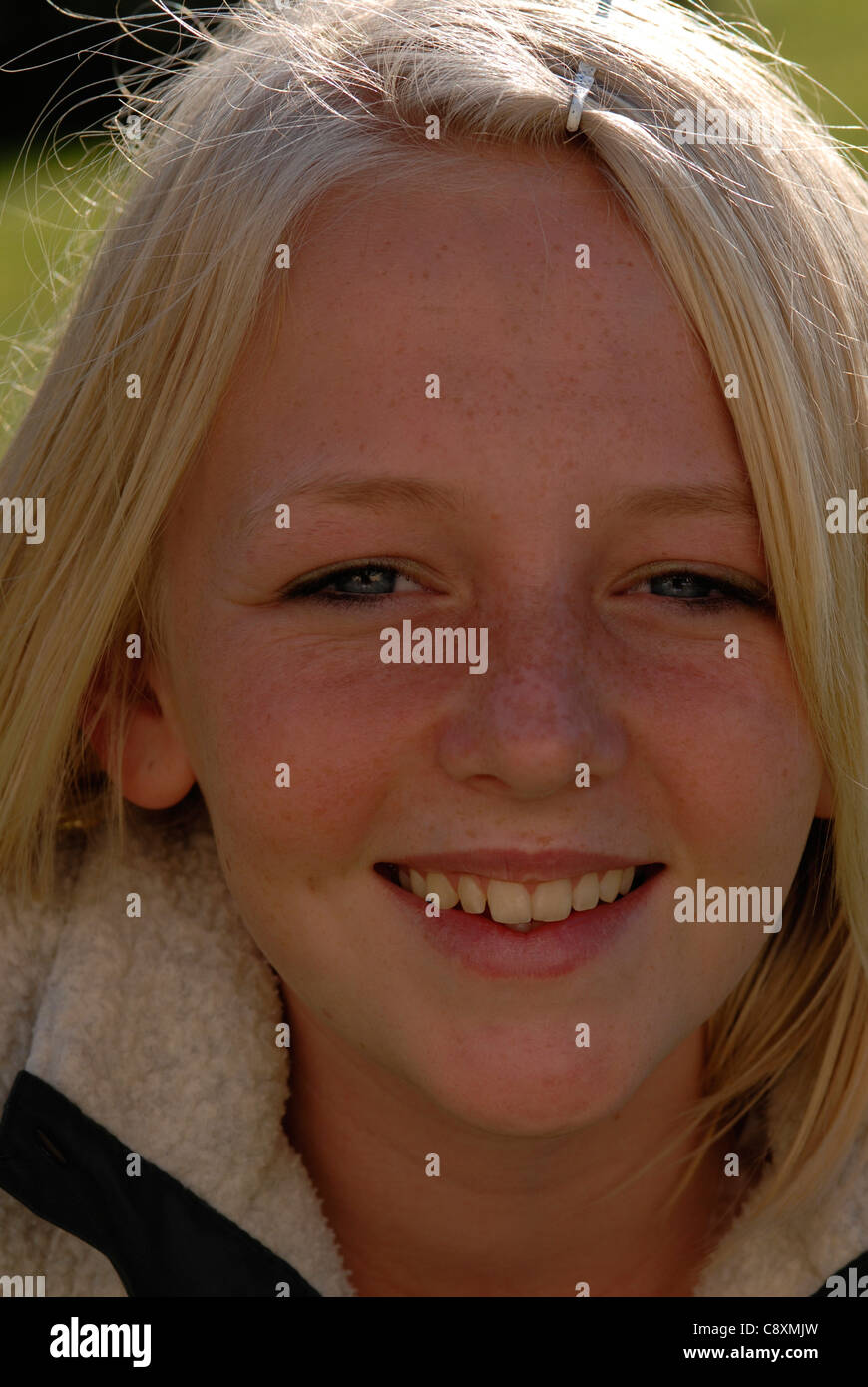 Head and shoulders portrait of a smiling teenage girl Stock Photo - Alamy