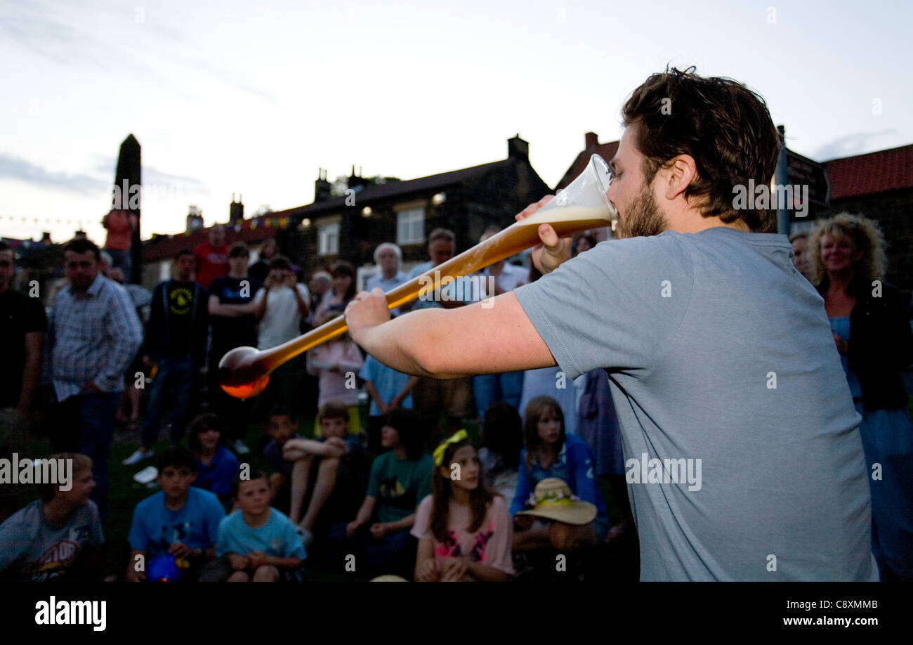 Man Drinking Yard of Ale During Osmotherley Village Summer Games North Yorkshire England Stock Photo