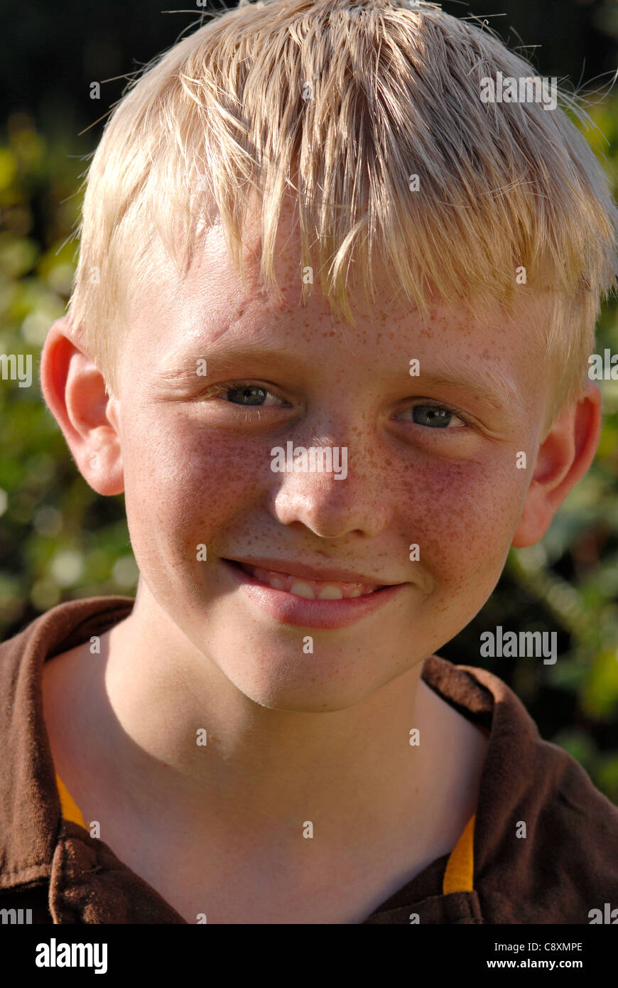Portrait of a boy with blond hair and freckles Stock Photo - Alamy